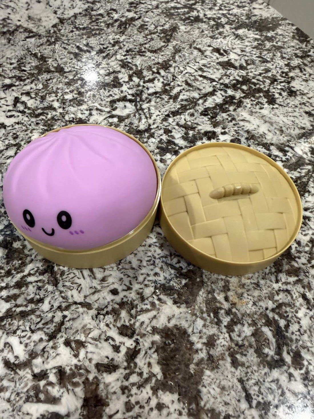 Pink dumpling squishy on a calm marble desk — visual companion for the 3 PM brain fog science breakdown