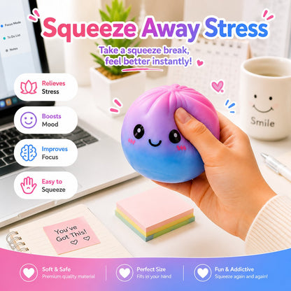 Galaxy dumpling squishy bao bun stress relief fidget toy held in hand at a desk