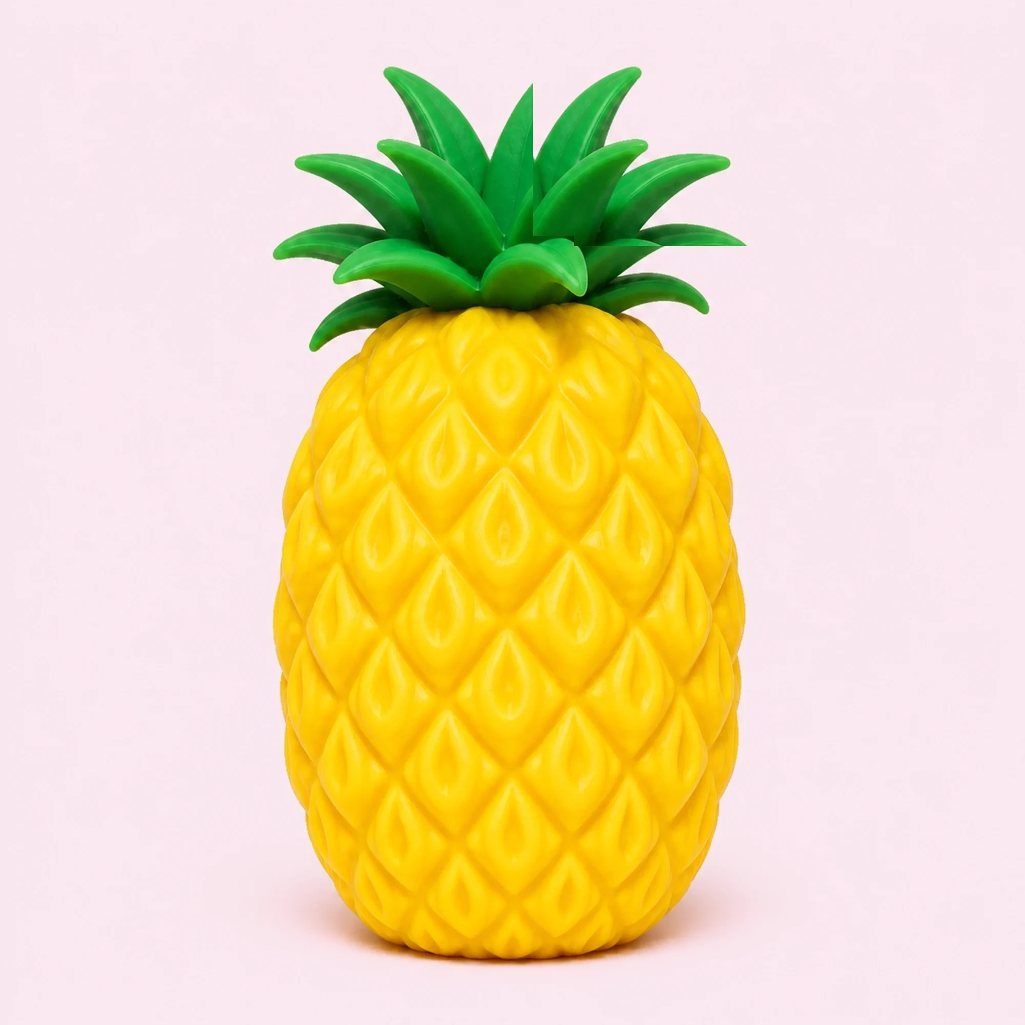 Large yellow pineapple squishy on pale pink background